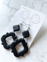 Load image into Gallery viewer, Black lightweight polymer clay earrings. 
